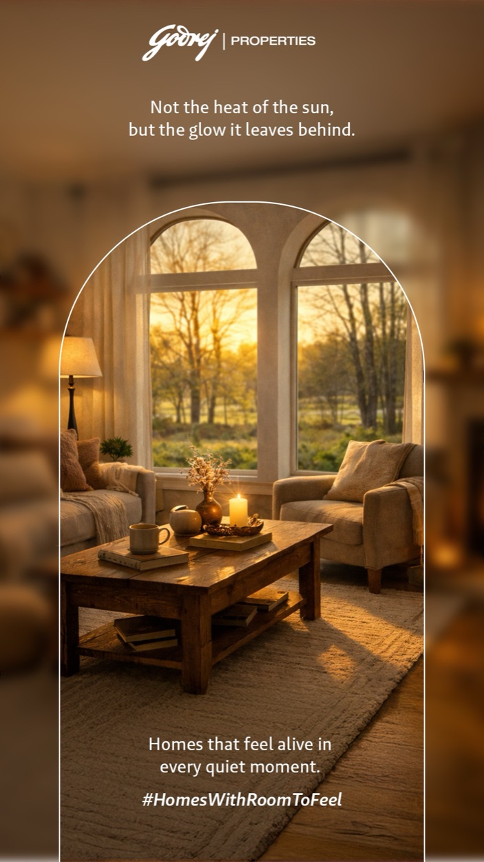 Story frame: a living room at golden hour around a low wooden table — “Homes that feel alive in every quiet moment.”
