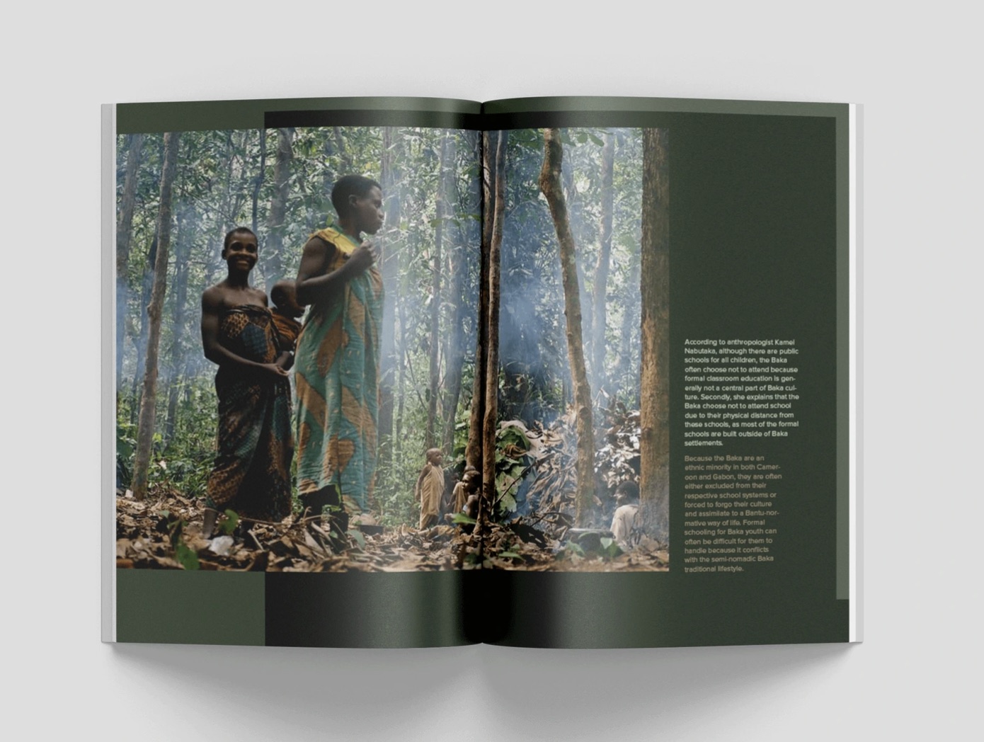 Spread: two figures standing among forest trees, deep green pages.